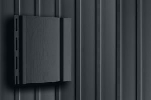 Виниловый сайдинг Grand Line Вертикальный Графит (Акрил)